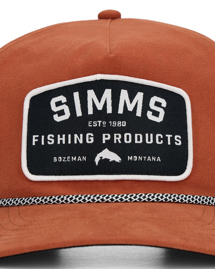 Brown cap with a Simms Fishing Products logo on a white background