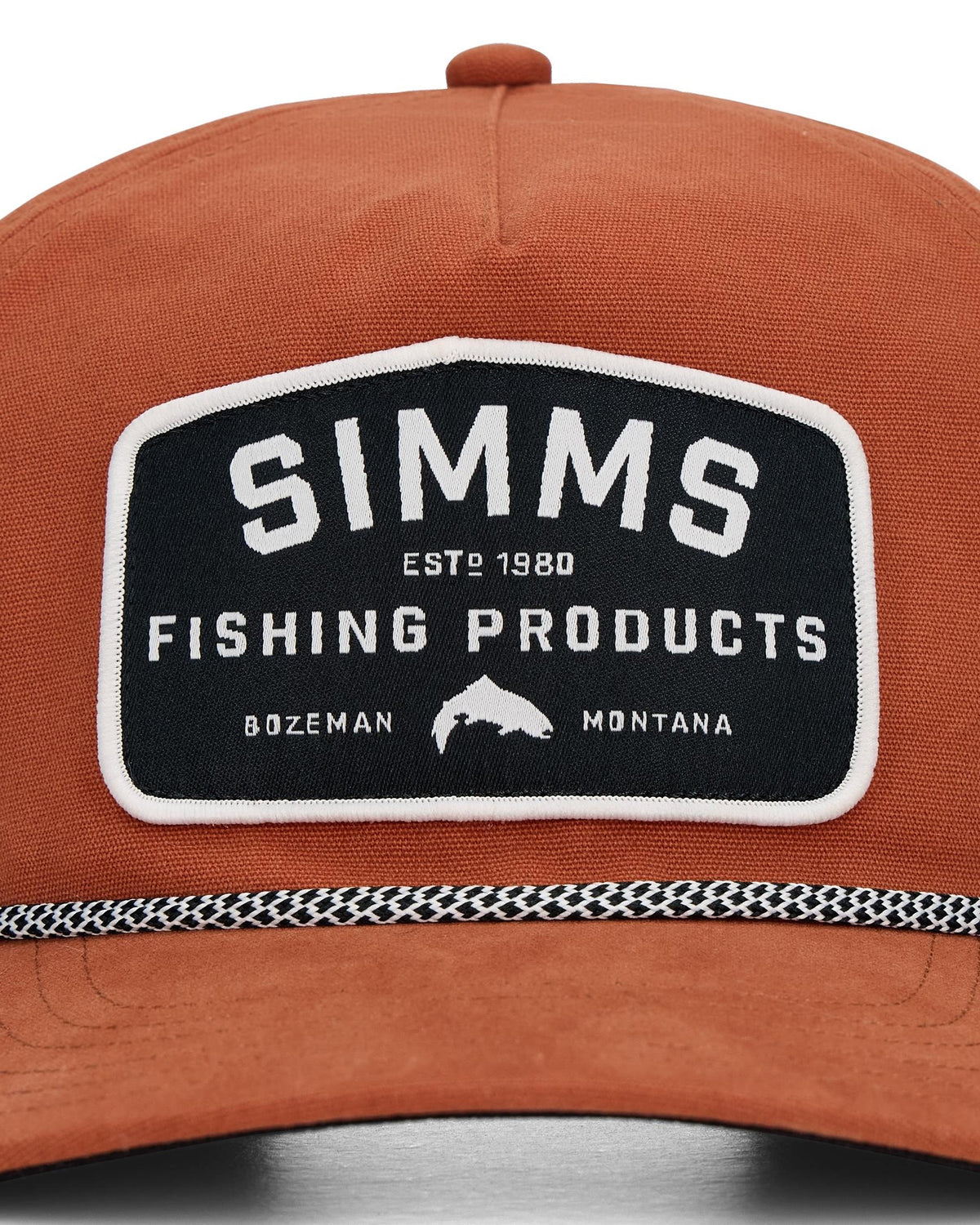 Brown cap with a Simms Fishing Products logo on a white background