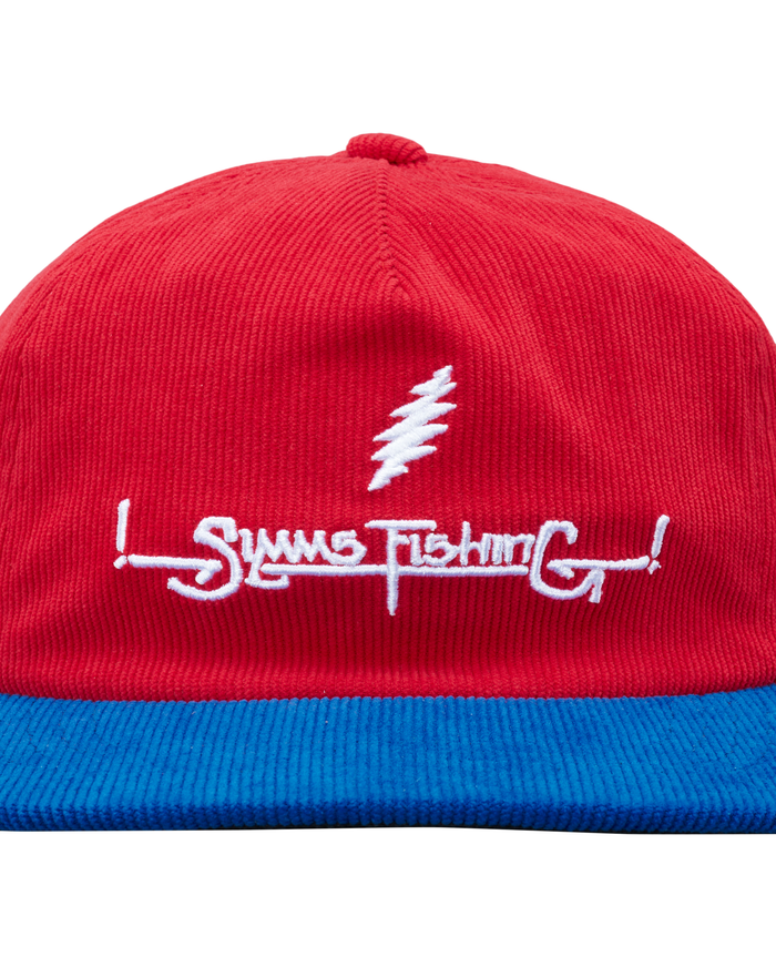 Red and blue cap with white embroidered text and logo on a white background -rollover
