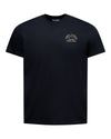 A black short-sleeve crewneck t-shirt with a small beige graphic on the left chest reading 'SOUTH TITUS FASHION Since 1989'. The brand 'SUTRANI' is visible printed inside the collar.