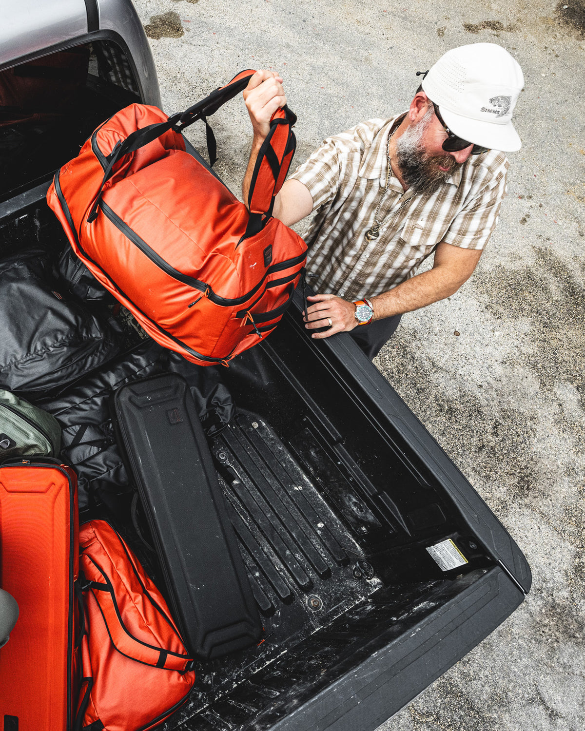 PDPLifestyles_F24_Tailwind_50LDuffel -rollover Simms Orange