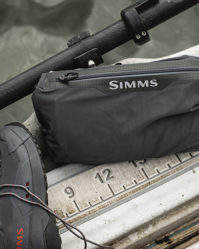 Simms flyweight wader packed into chest pocket