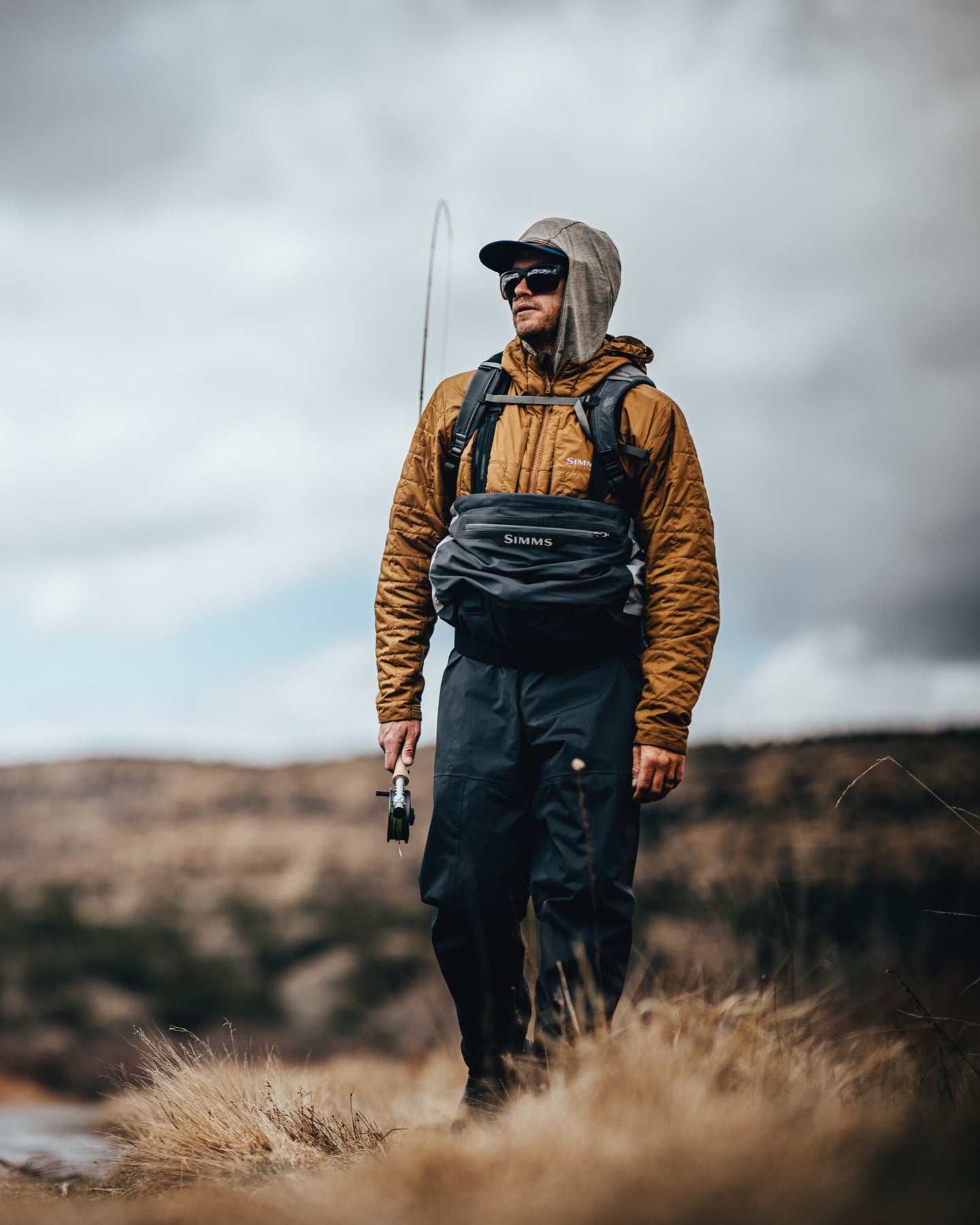 Simms Flyweight Packable Wader convertible in the field image