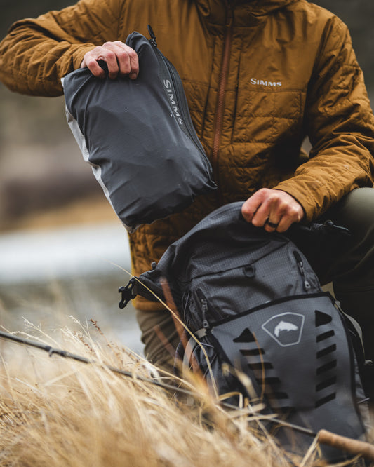 Men's_Flyweight_packable_wader folded_into_its_own_pocket -rollover
