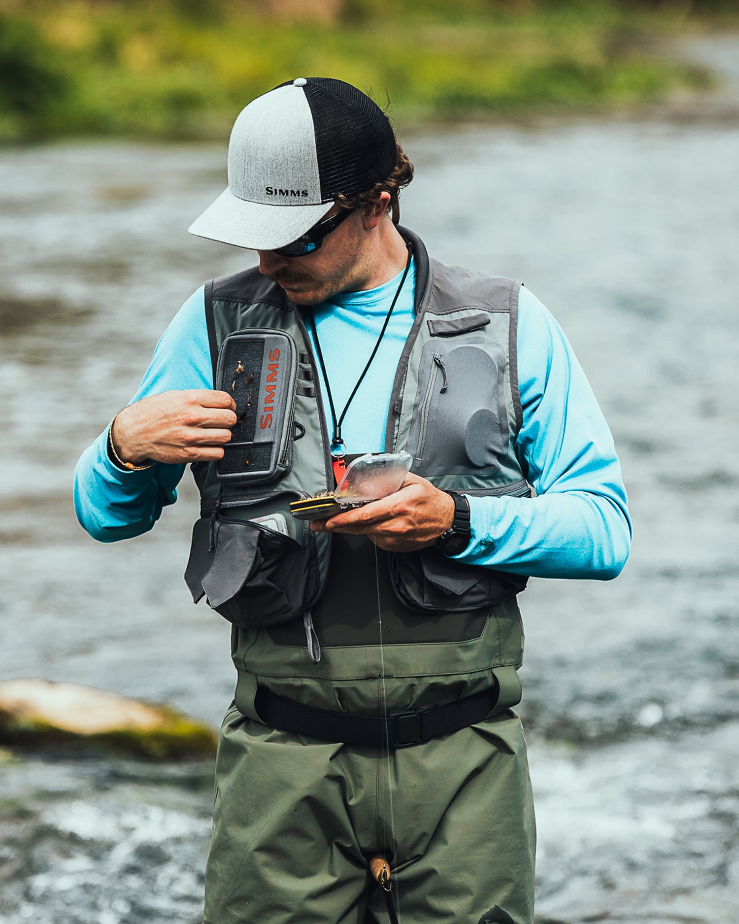 https://www.simmsfishing.com/cdn/shop/products/13402_Freestone_Vest_F21_2_1500x.jpg?v=1667316720